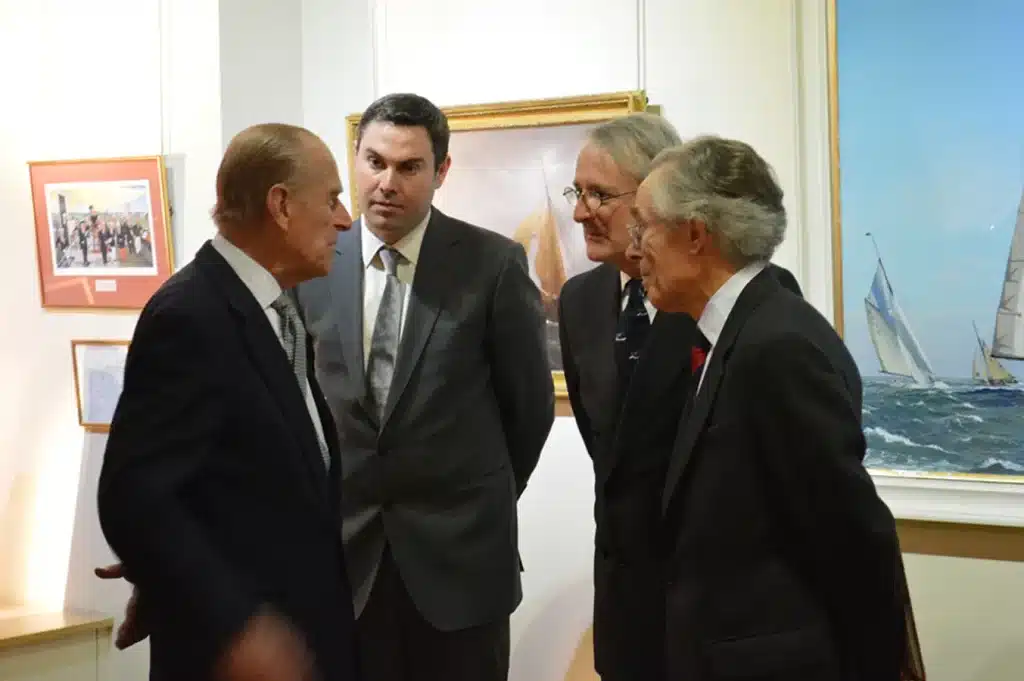 The Duke of Edinburgh with the owners of Rountree Tryon Gallery in front of Jamie Medlin's paintings
