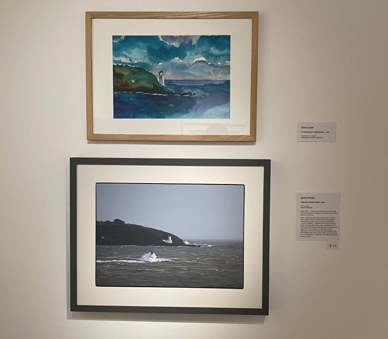 Framed wave study and coastal painting by Jamie Medlin hung at his exhibition