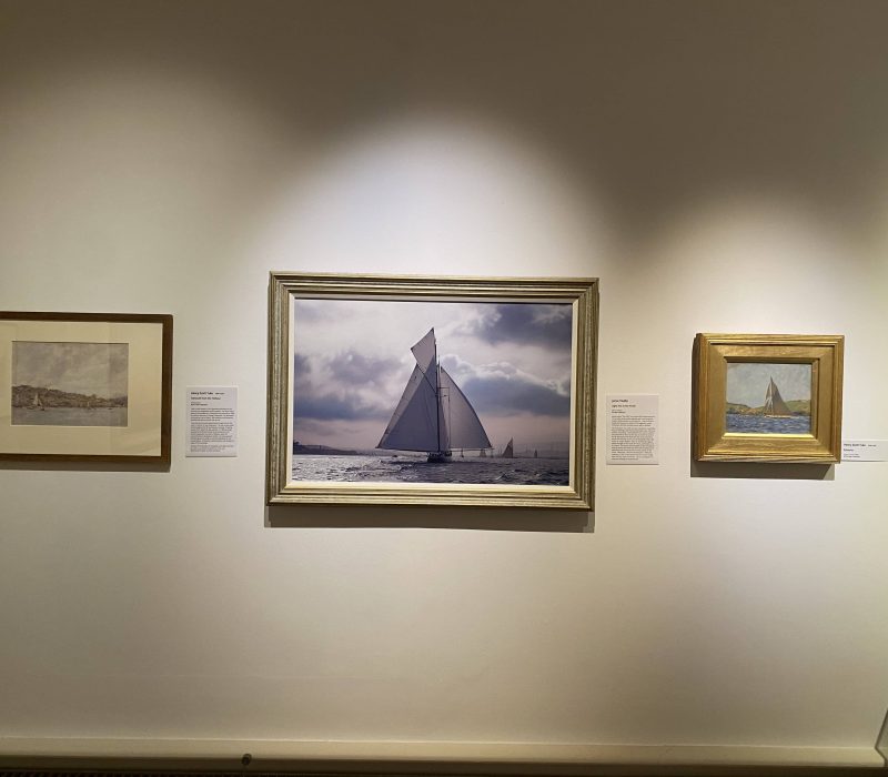 Large atmospheric seascape paintings on display at a Jamie Medlin exhibition