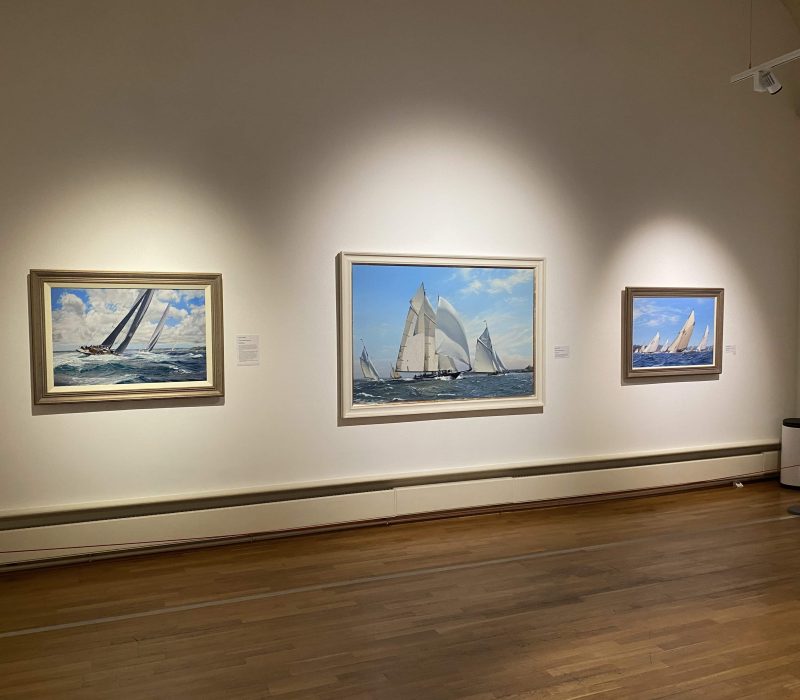 Three framed marine paintings including a classic schooner at a Jamie Medlin show