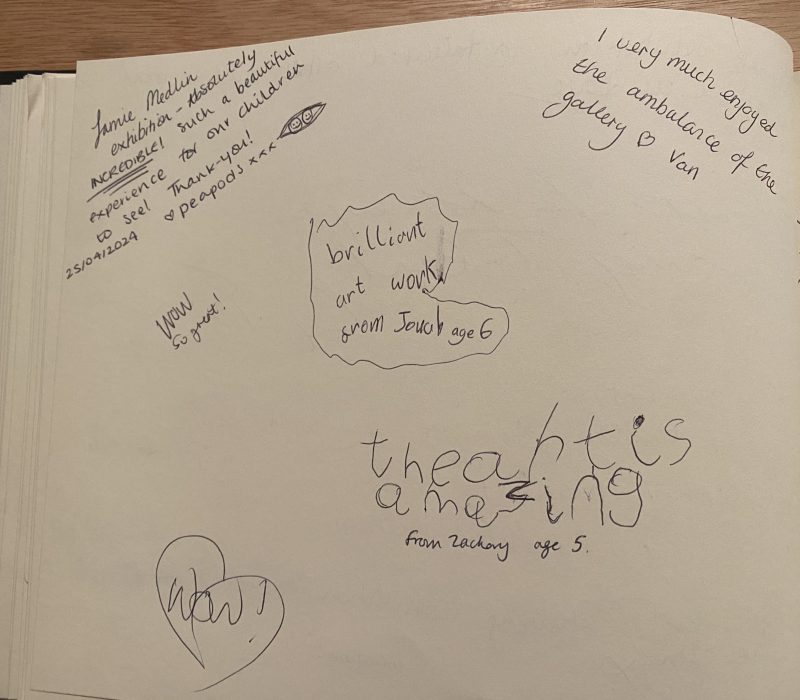 Handwritten visitor comments in the Jamie Medlin exhibition guestbook